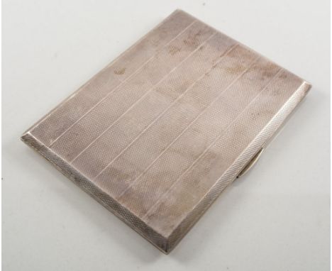 Silver cigarette case, Birmingham 1946, engine turned, 13cm and another, (2).