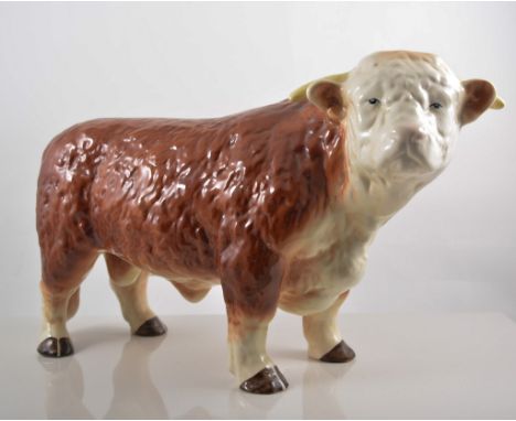 Large English pottery model of a Hereford Bull, indistinctly marked, possibly Melba ware, 27cm.
