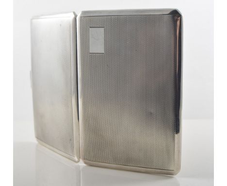 Silver engine turned cigarette case with plain rectangular initial plate, hallmarked Birmingham 1946, 15cm x 9cm, 6.5oz.