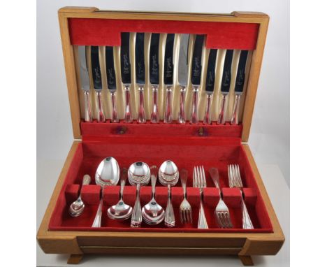 Canteen of Roberts & Dore silver plated six piece cutlery set in a light oak canteen.