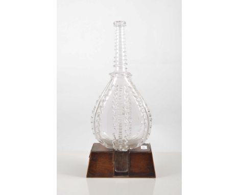 Novelty glass decanter, early 19th Century designed as a pair of bellows, 28cm on a walnut stand.