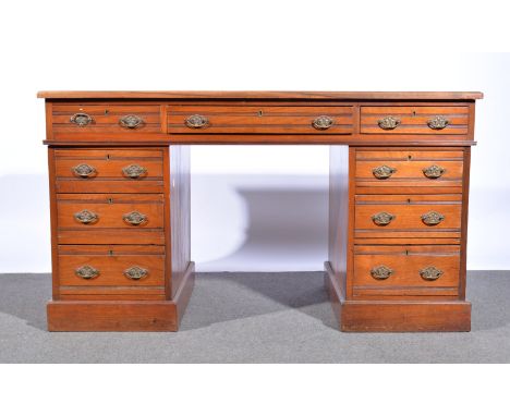 Victorian walnut desk, twin pedestal, nine drawers.