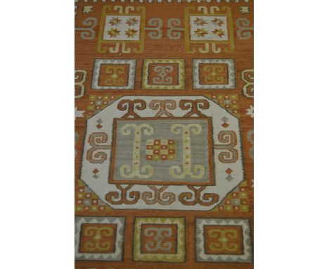 Moroccan style carpet, stylised guls, orange ground, 235cm x 170cm.