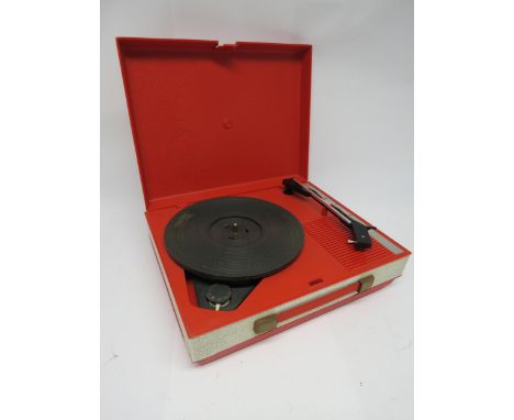A vintage Fidelity HF42 portable record player in red plastic casing 