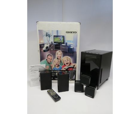 A boxed Onkyo HTX-22HDX digital home cinema surround sound system comprising subwoofer, two satellite speakers and three Camb