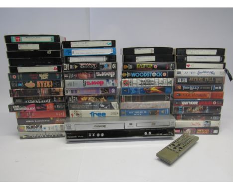 A collection of approximately 30 music video and concert film VHS cassette tapes including Jimi Hendrix, Alice Cooper, David 