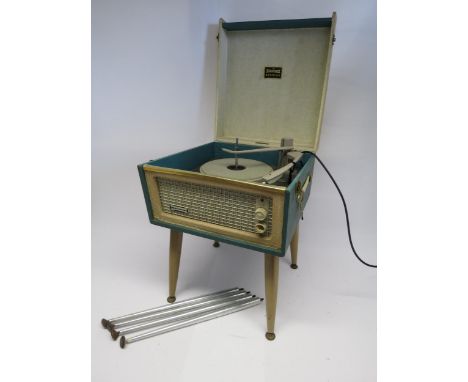 A mid 20th Century Dansette Bermuda record player, raised associated on tapering legs, together with an additional set of leg