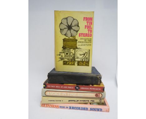 A group of books relating to records, comprising 'From Tin Foil To Stereo; Evolution Of The Phonograph', 'Hot Discograph', 'D