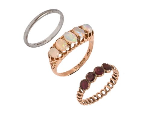 A 9 ct gold opal ring, five stone Size S.  4.5 grams together with a platinum wedding band, 2.59 grams and a garnet set ring.