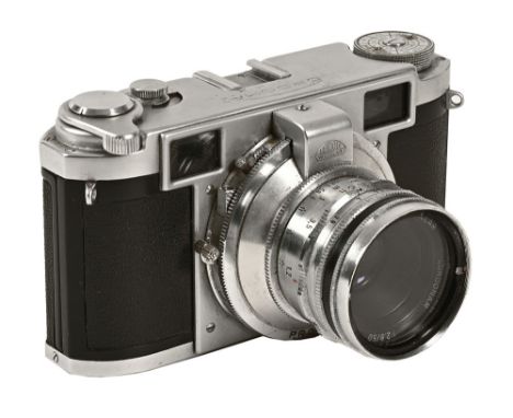 A Leidolf Wetzlar Lordomat Standard 35 mm film camera No 94143, with Lordomat 1:28/50 lens, leather case, hood and instructio