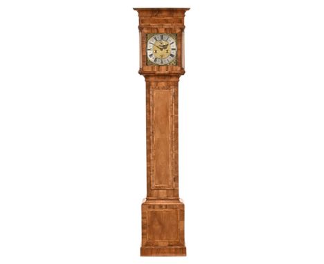 An antique walnut cased longcase clock, with silvered brass dial by William Underwood of London, two train movement with subs