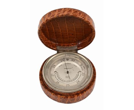 An Asprey of London large compensated pocket barometer, with mercury thermometer, the reptile skin case with hallmarked silve