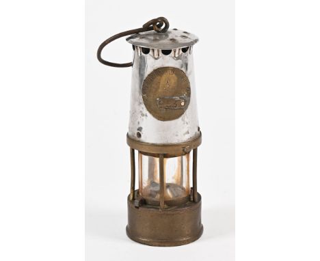 A Vintage miners lamp Eccles Manchester, Protector Lamp and Lighting Company.