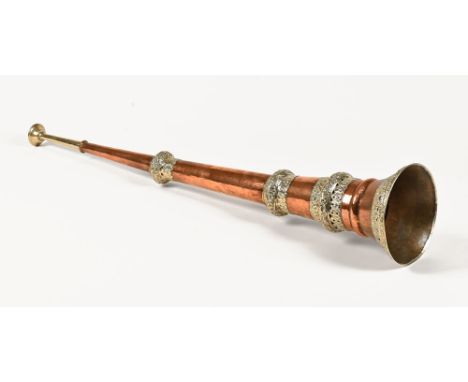 An early 20th century copper Tibetan trumpet Dungchen, Dunghorn of traditional style.  Extended length 89 cm.