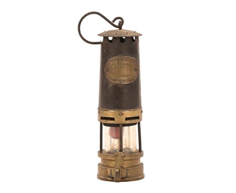 A vintage miners lamp by Thomas & Williams of Aberdare.  Height 28 cm.
