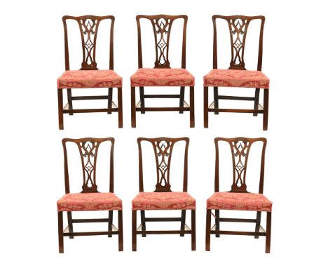 A good set of six George III Chippendale style dining chairs, each with yoke shaped top rail with carving to the centre and w