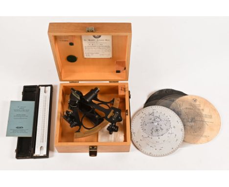 A cased sextant, Hukin Heath & Company "The Hezzanith Instrument Works" 1968, together with a navigation rule and star identi