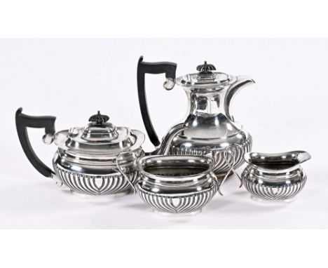 A Viner & Company Sheffield four piece silver half lobed tea service, 1931, gross weight 1989 grams (see illustration).