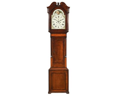 An early 19th century oak and mahogany cased longcase clock, by Jones of Llanfyllin, with two train striking movement and moo