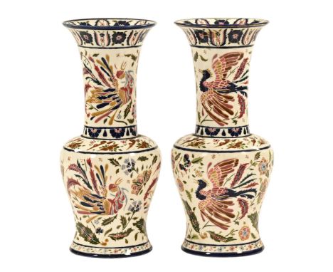 A pair of Zsolnay Hungarian ceramic vases, of shaped rouleau form with bird and foliage decoration.  Height 42 cm.   CONDITIO