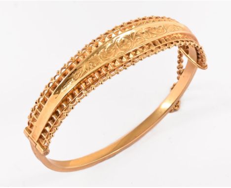 An Edwardian 9 ct gold bangle, stamped 9 and 375 Birmingham date letter R, internal measurements 6 cm x 5 cm.  Overall weight