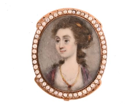 An antique portrait miniature on ivory, with gold coloured metal back the frame set with seed pearls.  33 mm x 27 mm.  NOTE: 