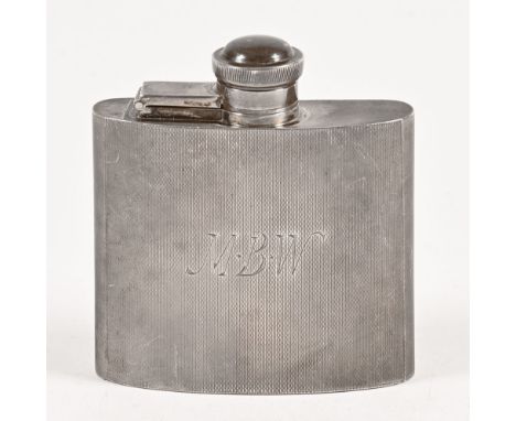 A silver hip flask, with engine turned body with initials MBW Chester 1956, maker Lowe & Son.  Weight 107 grams.
