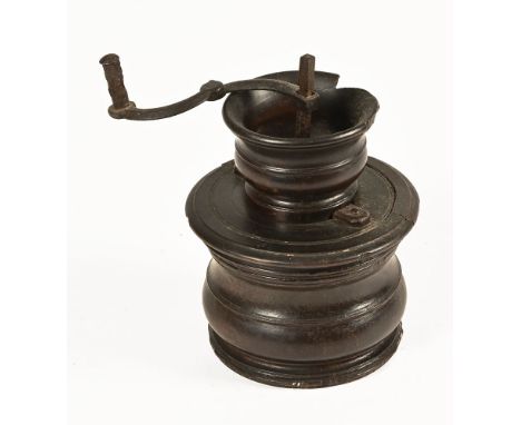 A George III Lignum Vitae coffee grinder.  Height 17 cm, base diameter 10.5 cm.   CONDITION REPORT:  The coffee grinder requi