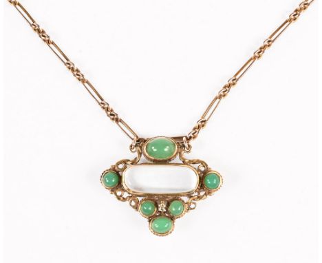 A 9 ct gold chain suspending a pendant/brooch, stamped 18 set with green jade coloured stones, gross weight 11.7 grams.   CON