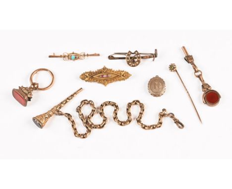 A 15 ct gold bar brooch, set with small diamonds and two ruby coloured stones, together with a 9 ct gold bar brooch set with 