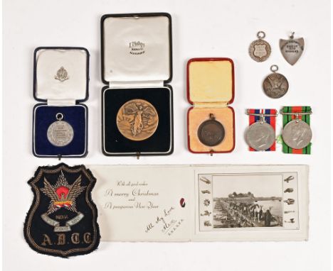 A collection of medals and certificates, including medal to Turner JA Aircraft Depot Athletics Sports 1934, cased.  A Royal L