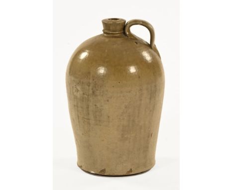 A 19th century earthenware spirit flask.  Height 40 cm.