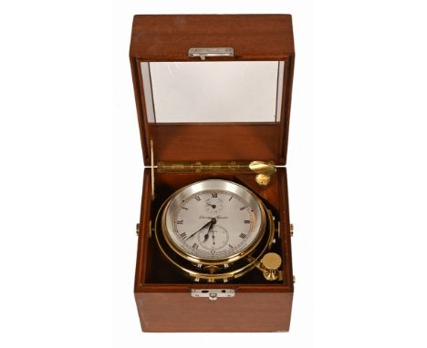 A Thomas Mercer marine chronometer, 56 hour No. 22959, silvered dial.  Case diameter 12.5 cm, complete with case and gimbal (