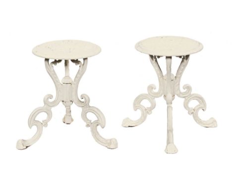 A pair of white painted cast iron planter stands, each with pierced top and scroll supports terminating in scroll feet.  Heig