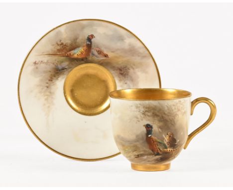 A Royal Worcester coffee cup and saucer, decorated with pheasants and signed JAS Stinton, the cup (AF).