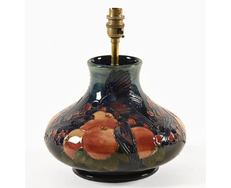 A Moorcroft Finch and Berries pattern lamp.  Height 20 cm, with impressed marks to the base Moorcroft Made in England and wit