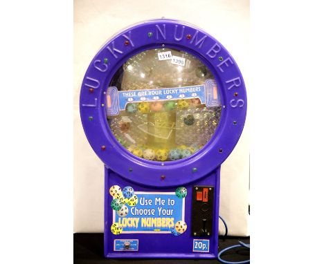 Novelty lucky number generating machine to choose random lottery numbers, H: 90 cm. This lot is not available for in-house P&