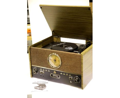 GPO Maestro Music Centre; three speed turntable; MP3/USB player; bluetooth; FM radio; wooden case &amp; manual. P&amp;P Group