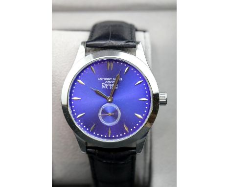 New boxed Anthony James blue faced wristwatch on a leather strap. P&P Group 1 (£14+VAT for the first lot and £1+VAT for subse