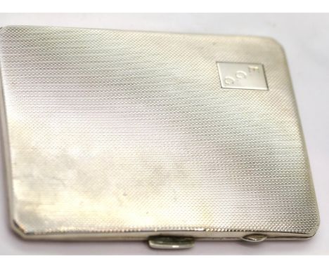 Hallmarked silver engine turned cigarette case, 160g. P&amp;P Group 1 (£14+VAT for the first lot and £1+VAT for subsequent lo