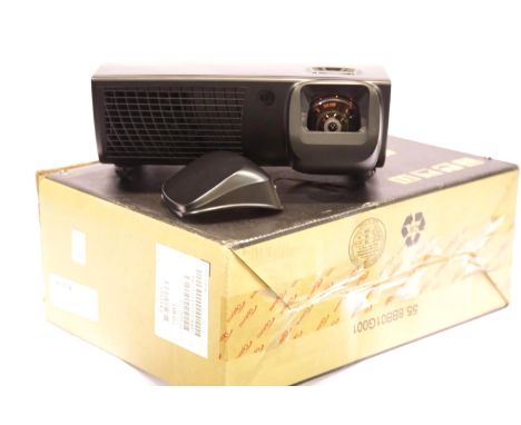 As new in original box Optoma EX525ST projector. This lot will attract VAT at 20% on the sale price. P&amp;P Group 3 (£25+VAT