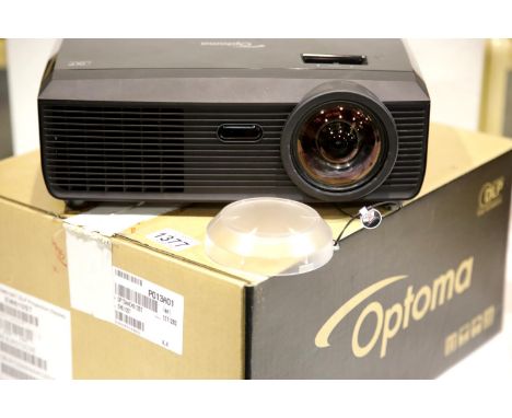 Boxed as new Optomax EW601ST projector in original box. This lot will attract VAT at 20% on the sale price. P&amp;P Group 3 (