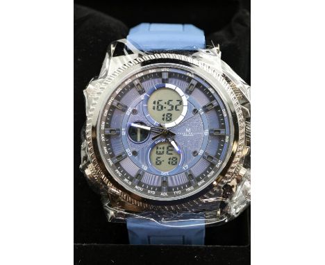 New boxed Michael Philippe blue faced multi dial wristwatch on a rubber strap. P&P Group 1 (£14+VAT for the first lot and £1+