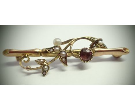 Cased 15ct gold brooch set with an amethyst and seed pearls lacking pin, 2.4g. P&amp;P Group 1 (£14+VAT for the first lot and