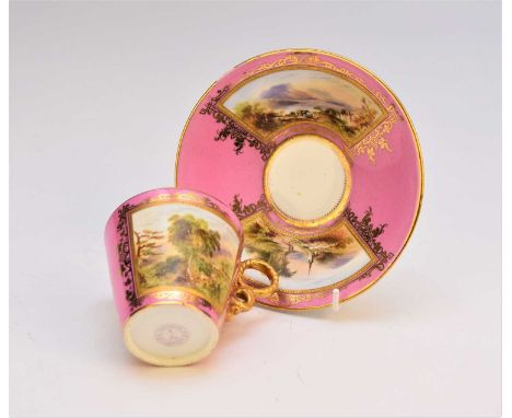 A Coalport cabinet cup and saucer, circa 1870-80, with rope-twist handles, the bright pink ground decorated with opposing pan