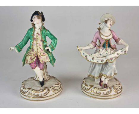 A pair of Minton tinted parian candlestick figurescirca 1851modelled as a dancing gentleman with a glazed frock coat together