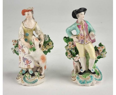 A pair of Derby porcelain figures of the Dresden Shepherd and Shepherdess, model 55, 18th century, patch marks, 15cm high(2)M