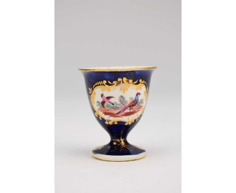 A Chamberlain's Worcester egg cup, early 19th century, the scale blue ground decorated with a cartouche of two Fancy Birds, w