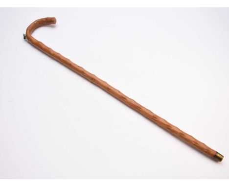 A novelty walking, 'measuring', stick, the shaft enclosing a 100cm steel ruler in turn enclosing a 33cm long, hinged brass ar