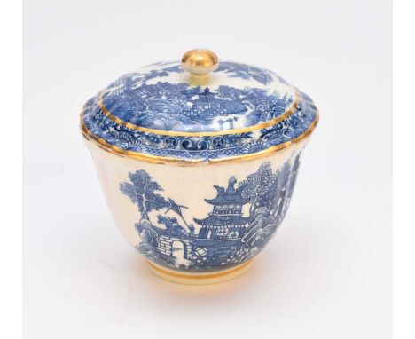 A Caughley 'Temple' sucrier and cover, circa 1782-94, with a reinforced upper rim, transfer-printed in underglaze blue with a